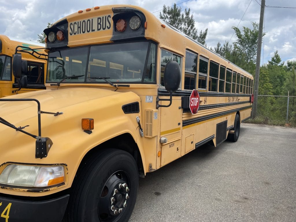 school buses before protective coating
